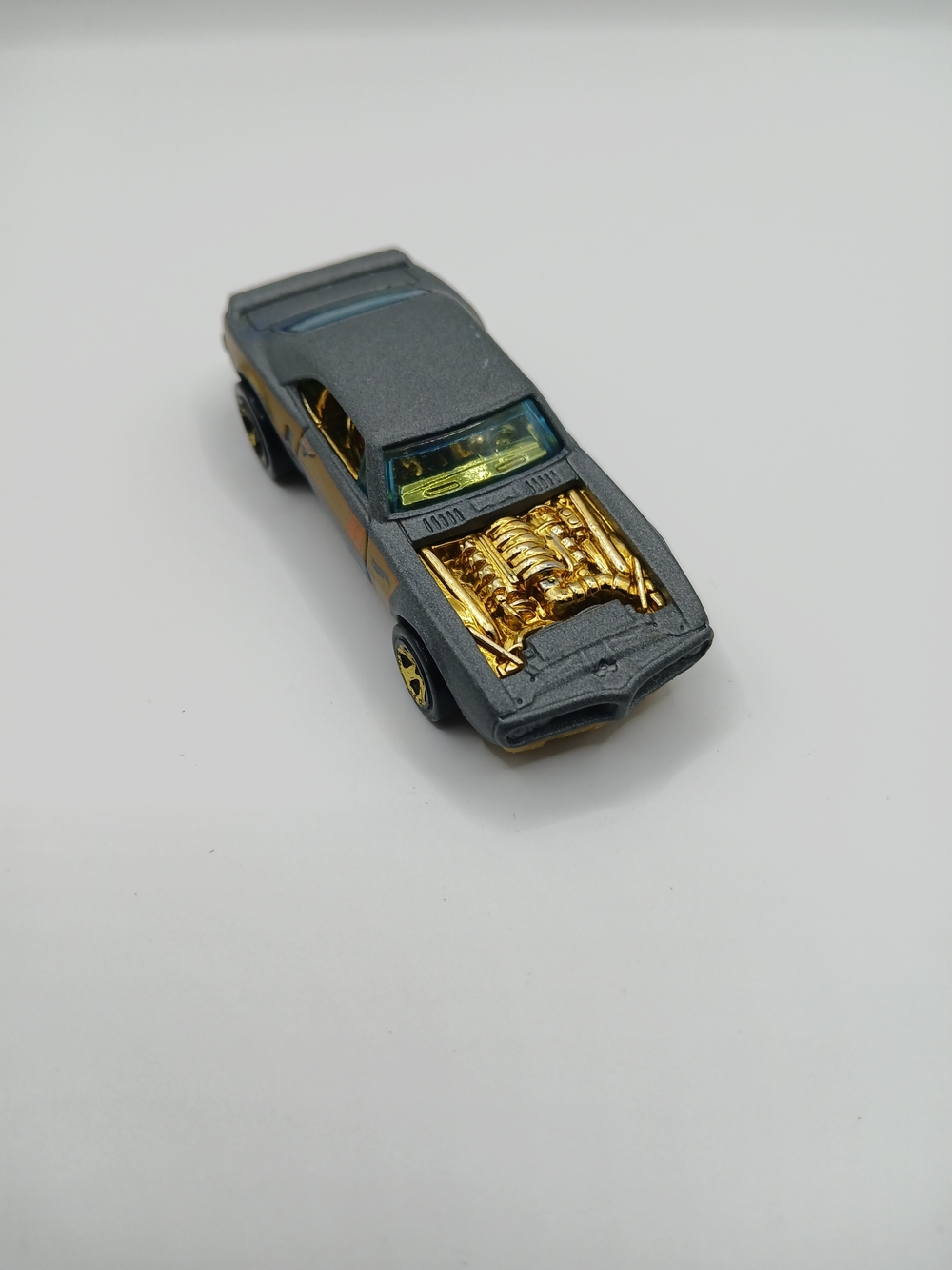 Gray Toy Muscle Car with Gold Engine Detail